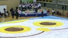 Students attempt new record for largest origami mosaic