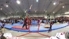 Gymnastics Coach Performs Acrobatic Rescue of Young Athlete