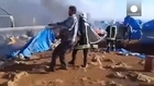 Air strike kills dozens in Syrian refugee camp
