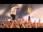 Singer catches beer while crowdwalking, and drinks it!