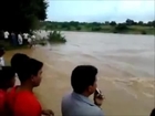 At Least 32 Dead as Bus Sweeps Away in Flood