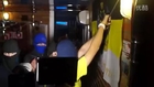 Kiev nationalist girl and her boyfriends clean up pro-Russia signs in store