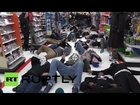'Divided we fall' Ferguson protesters target St. Louis Walmart