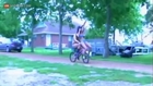 Cute girls in bikinis riding together on one bike with a loaded shotgun is a dangerous mix
