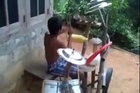 Small Boy Playing Music on drum So Good