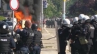 Kosovo Albanians torch cars, police fire rubber bullets in divided town